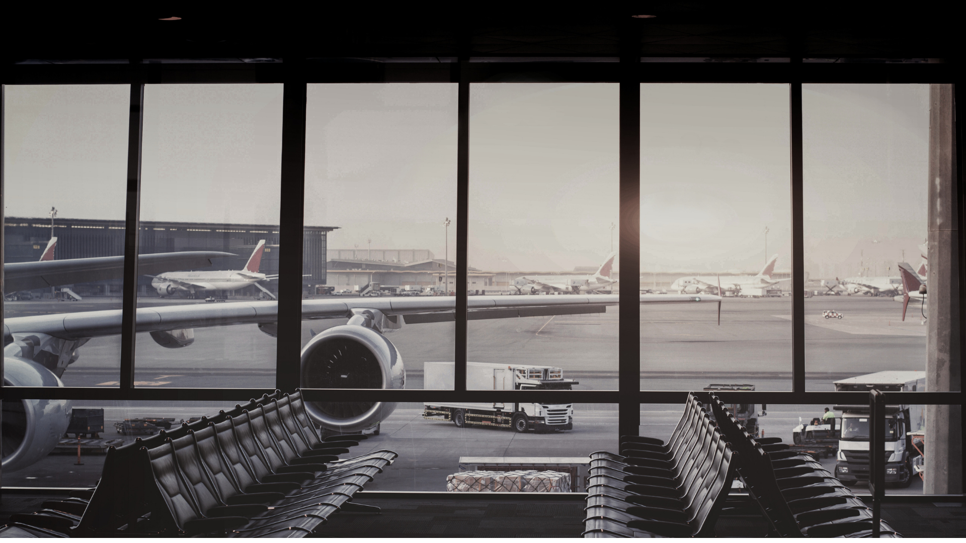 Airport lounge picture with airplane in the background